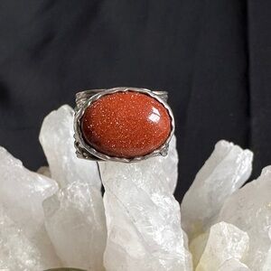 Silpada EUC red goldstone ring. Wide twisted wire band in 925 sterling